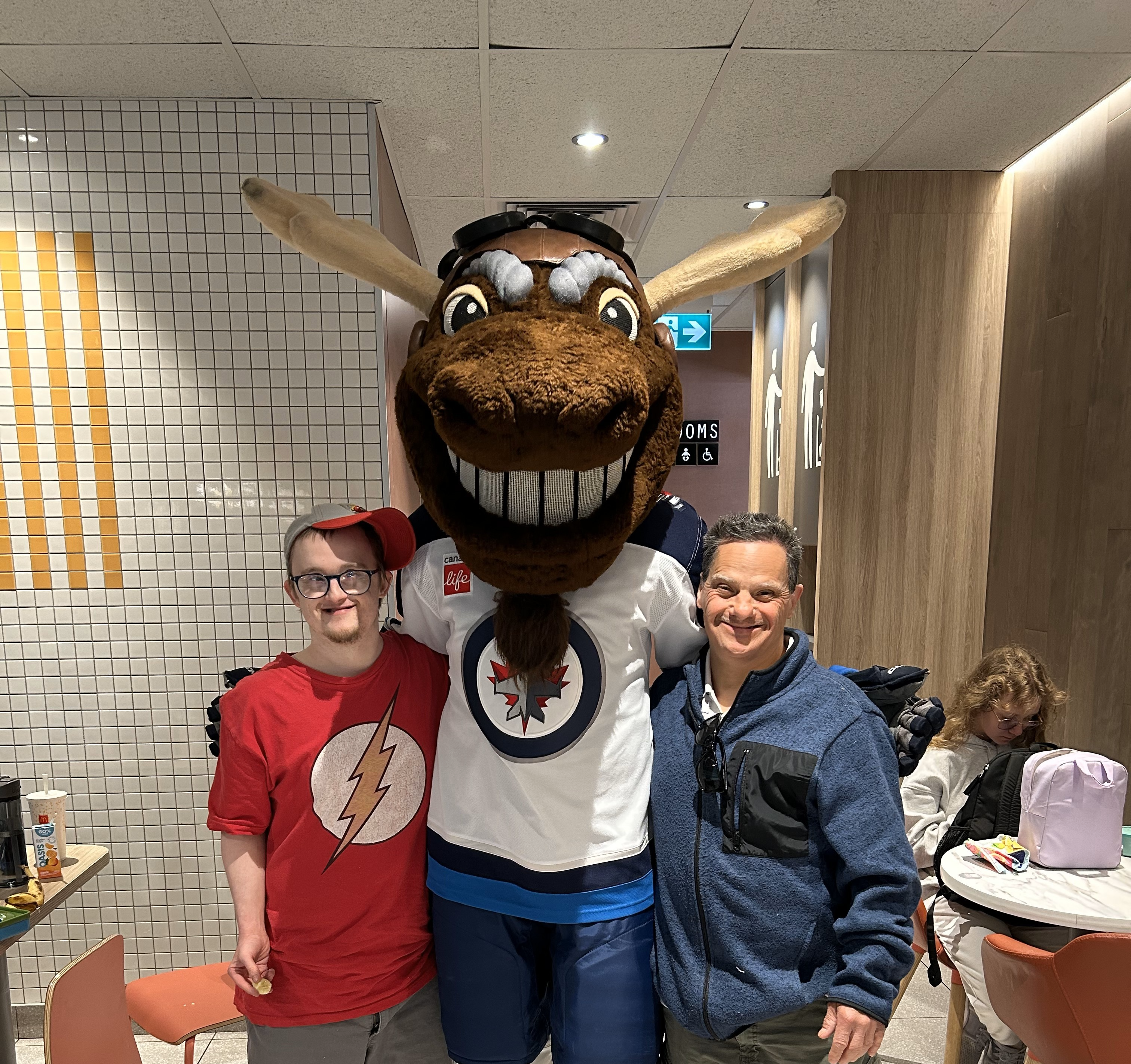 Three people posing for a picture