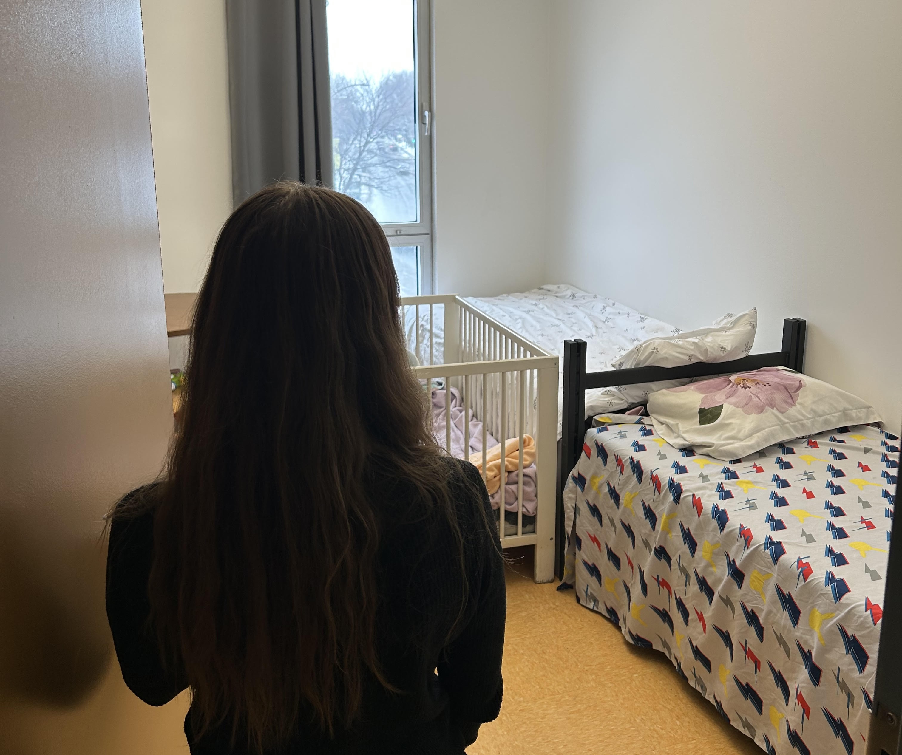 Shelter client observes room